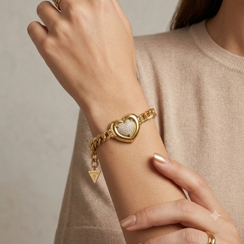 Guess Damenarmband Elegantes Goldarmband mit Herzanhänger
